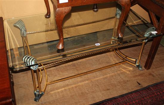 A brass and glass coffee table